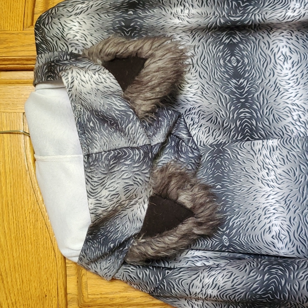 A wolf "romper" hoodie with ears.